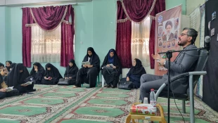 برگزاری ویژه برنامه اولین سالگرد شهید خدمت آیت‌الله سید ابراهیم رئیسی و شهدای خدمت در آموزشکده ملی مهارت دختران بوشهر 4